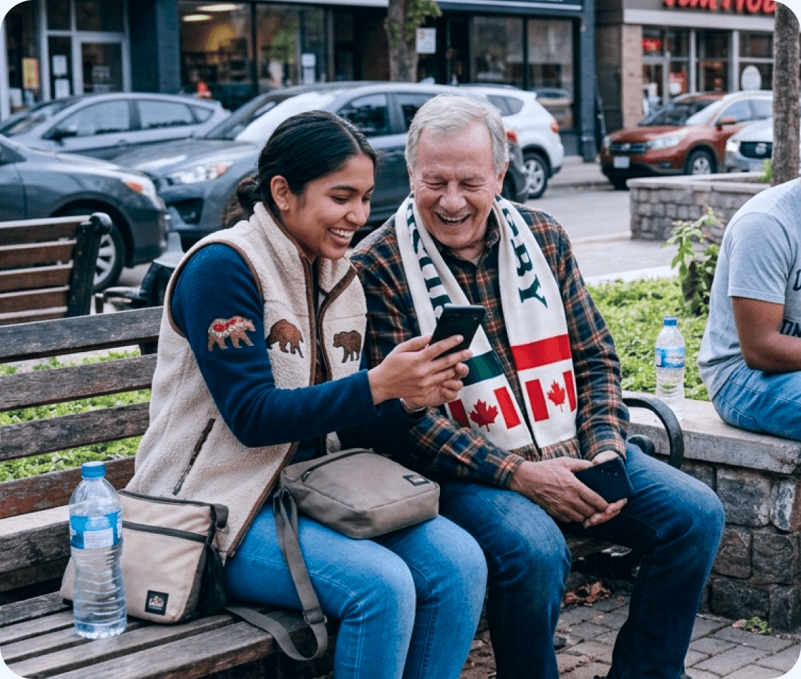 Community members using the NexSpace mobile app together on a park bench